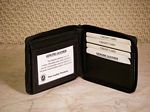 Leather Zip around wallet with two ID windows.
