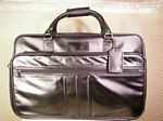 Leather Travel Bag with Fold Down Garment Feature